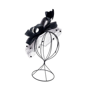 Bow and feather headpiece with veiling
