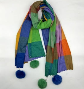 Checked winter scarves with pompoms