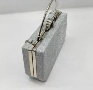 Glitzy clutch bag with handle