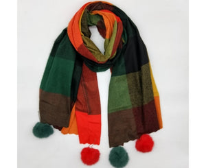 Checked winter scarves with pompoms