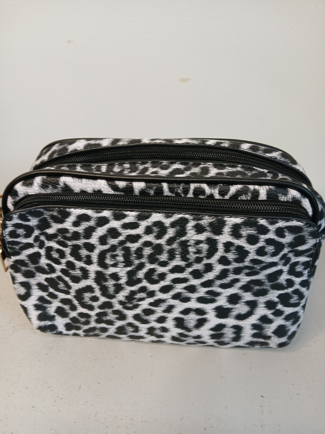 The Frances Animal print Crossover bags