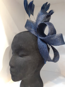 Headpieces with hairbands ,swirls and feathers