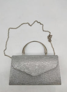 Clutch bags with metal handle